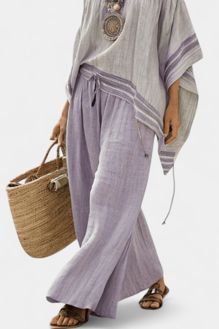 Eden | Shoulder and wide-leg striped trousers