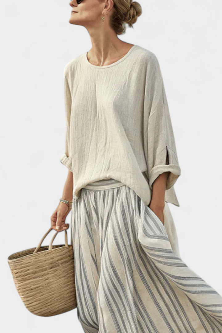 Gia | comfortable blouse and striped midi skirt